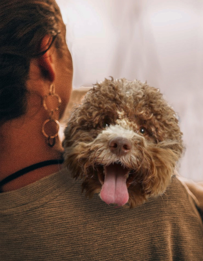 woman holding her dog